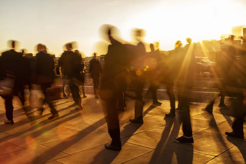 A moody shot of business people walking