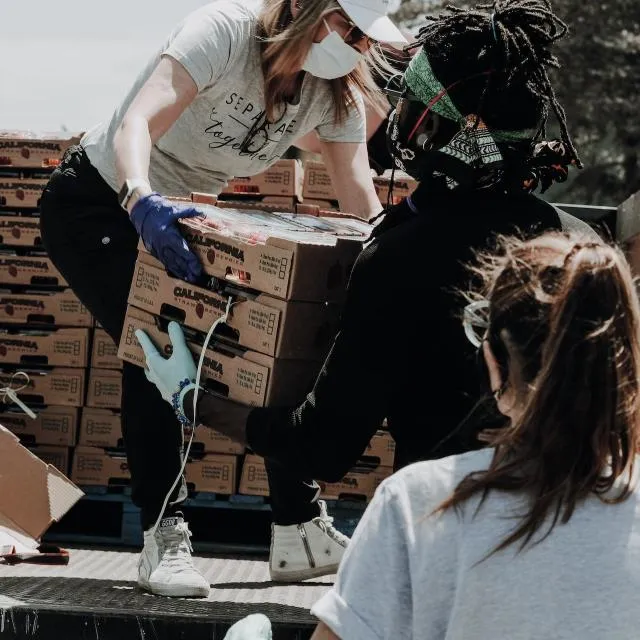 Volunteers wearing masks